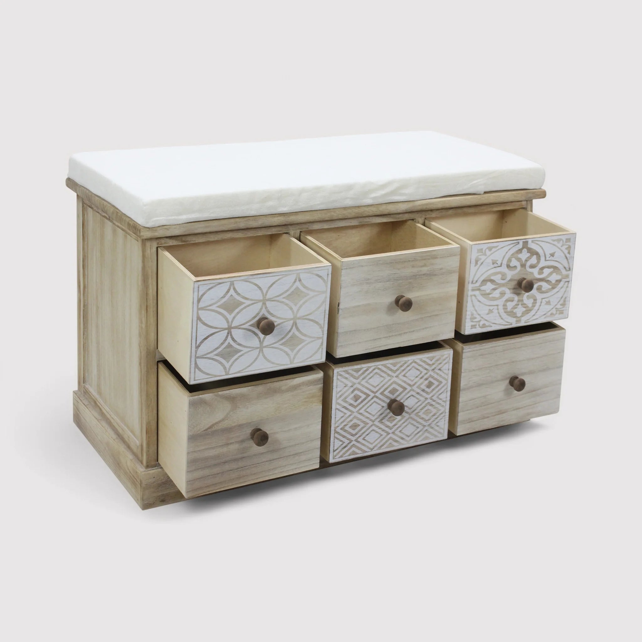 Pecho con cajones decorados y asiento tapizado