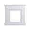 White decorative fireplace frame in...