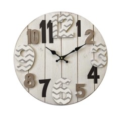 Reloj de pared beige con números modernos
